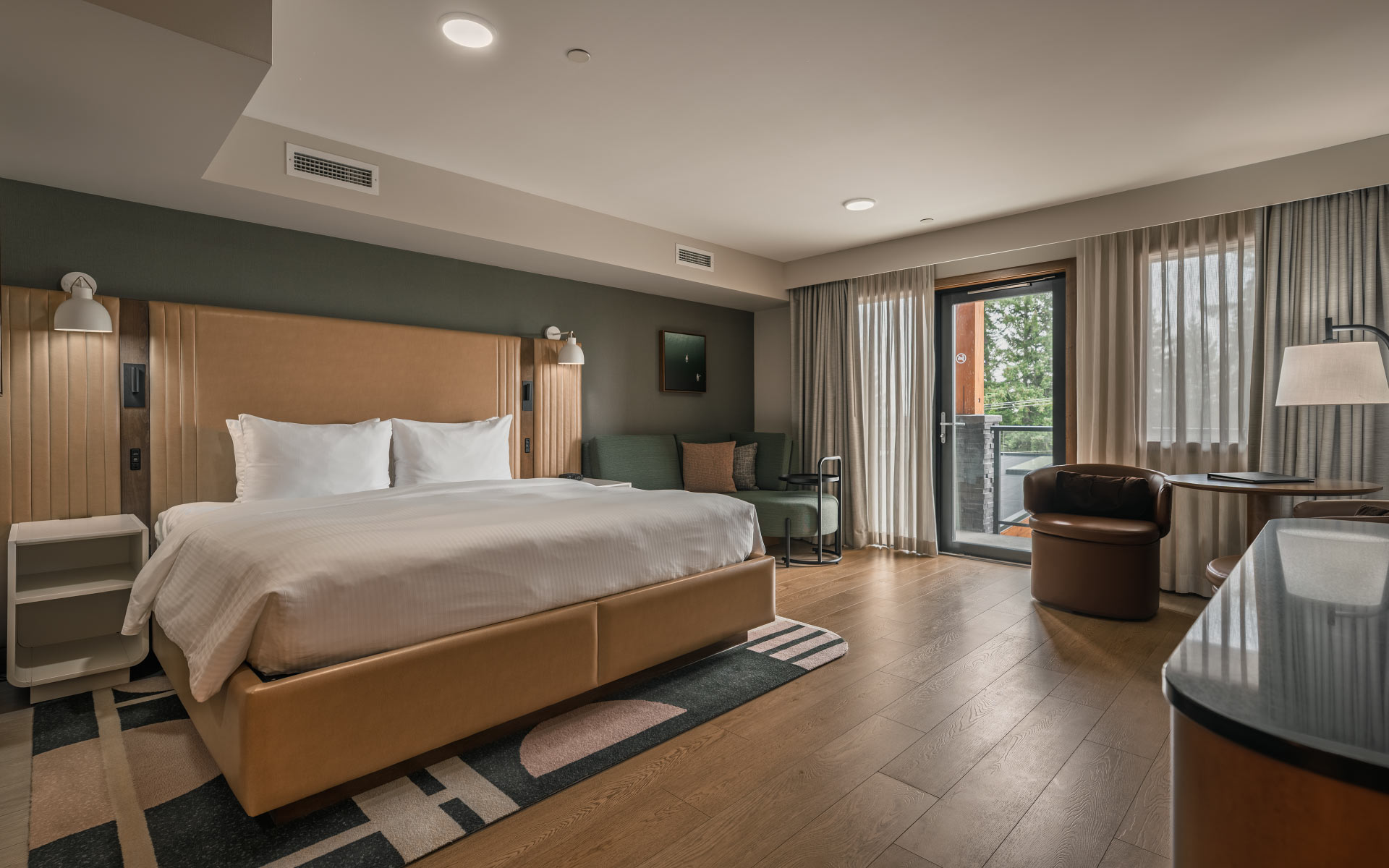 Bed and interior design of a room at the resort